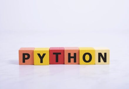 Colorful wooden blocks spelling 'python'
